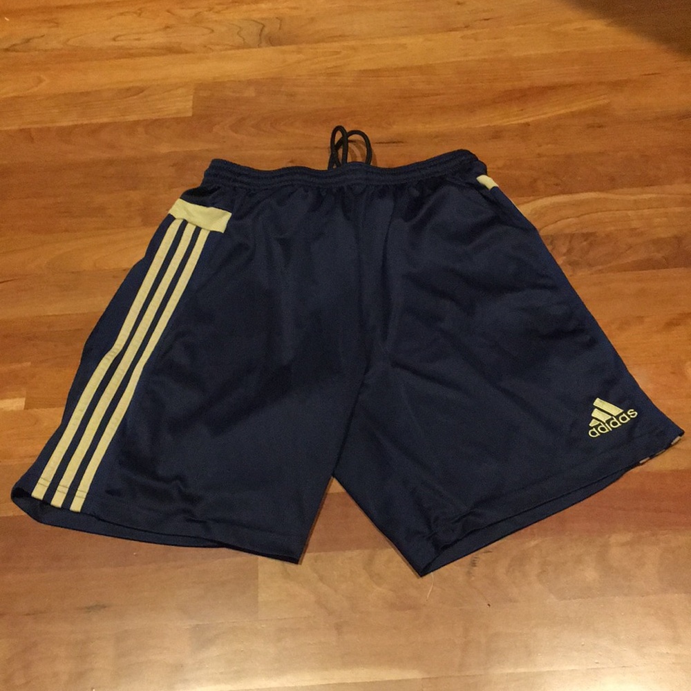 Blue and gold sports shorts.